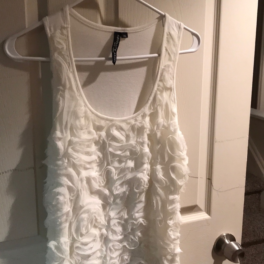 Sleeveless blouse.  New